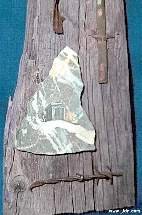 Closeup of Outhouse Painted on a Rock Slab