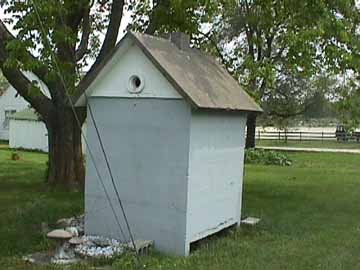 Back View of the Concrete Outhouse Clearly Shows the Concrete