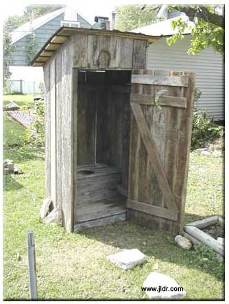An Outhouse constructed from a collapsed barn