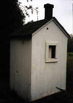 The Back View of the Outhouse