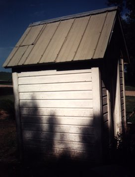 Another view of the right side showing the tin roof