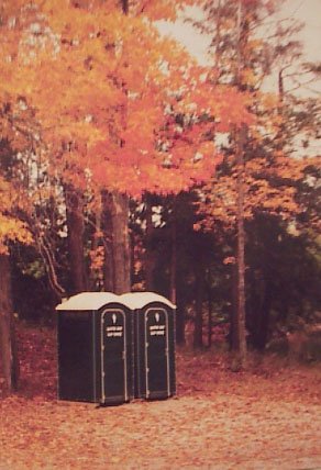 Beautiful Fall Picture of Portable Outhouses