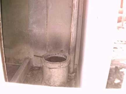 An indoor Outhouse found in a home
