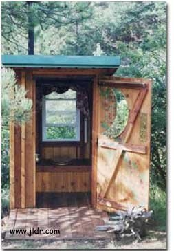 Competed Outhouse with Door Open