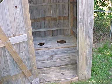 Inside the homemade Outhouse