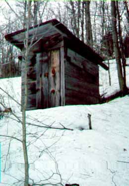 Close-up View of the Outhouse