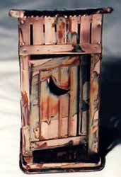 Front View of the Copper Outhouse
