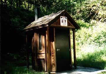 Front View of a Fancy Campground Outhouse in Oregon