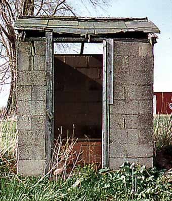 Closeup of Cement Block Outhouse