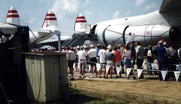 Constellation Airliner with Outhouse Shed in Foreground