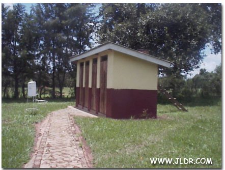 Side view of the Uganda Outhouses